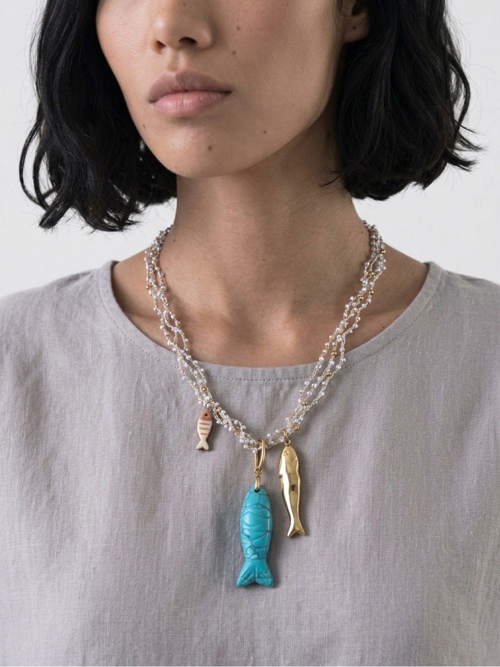 Layered Turquoise & Gold Fish Charm Necklace by